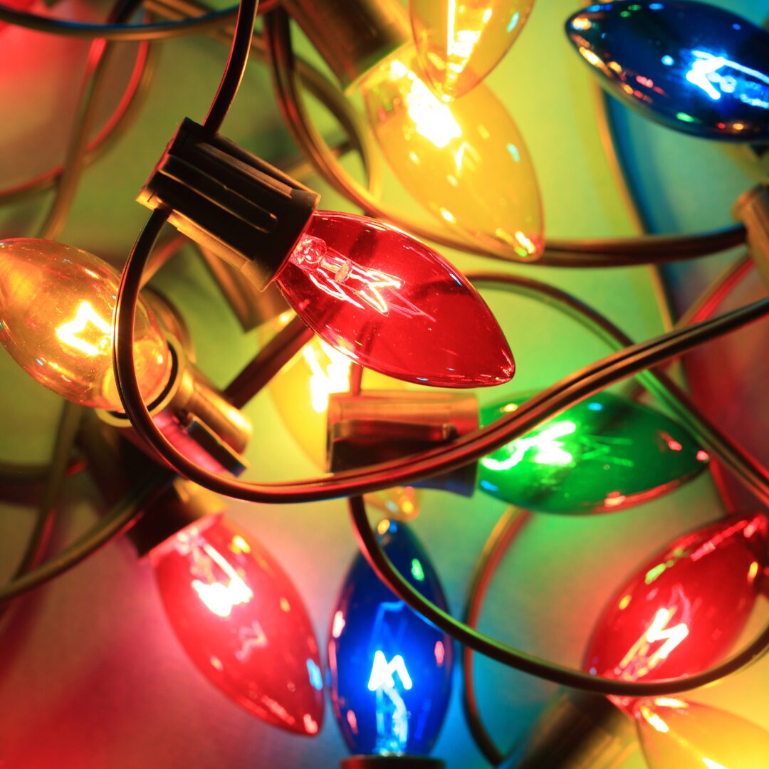 Purple star-shaped decorative lights hanging outdoors